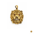 Front view of Le Lion aux Saphirs, a 9ct gold lion pendant with sapphire eyes, on white