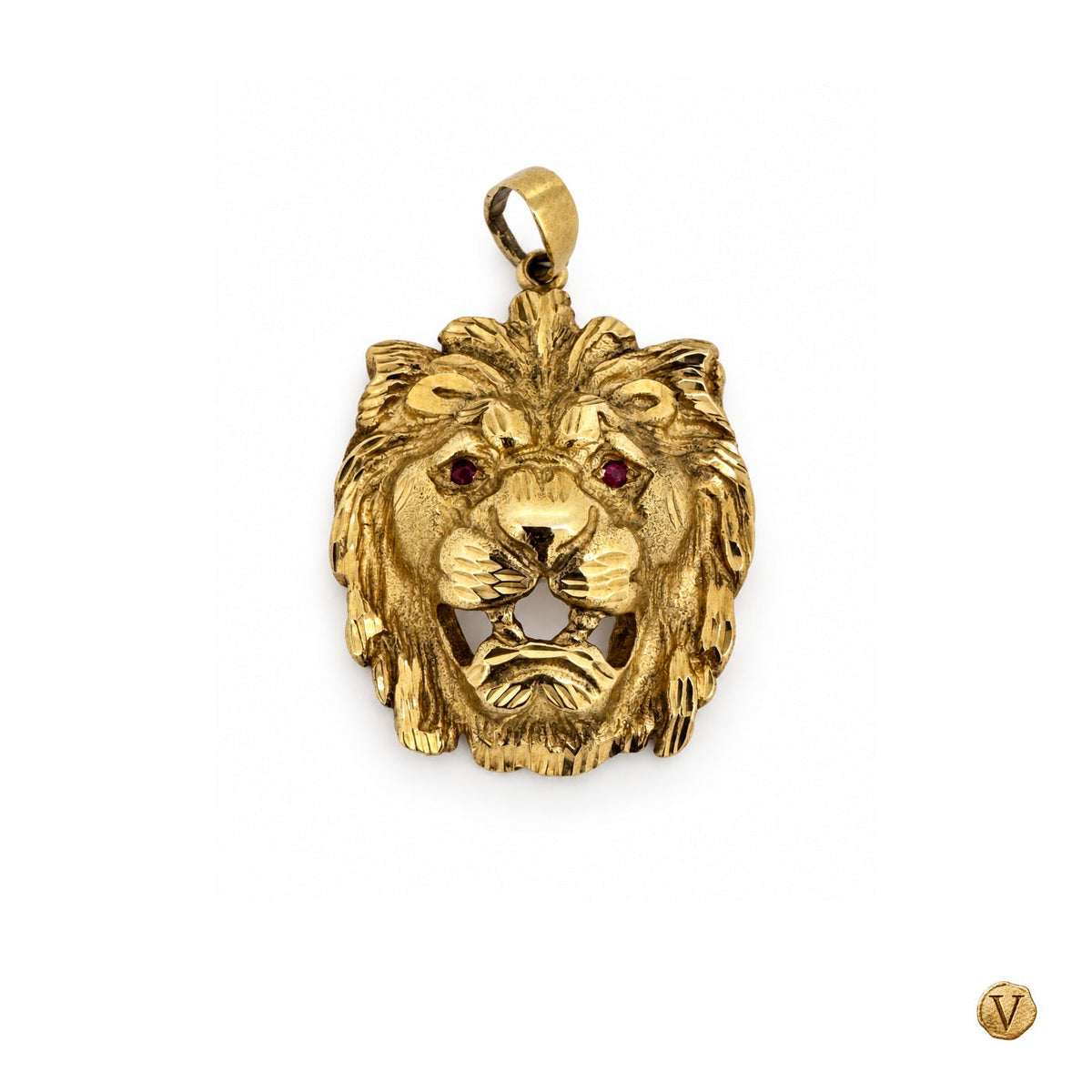 Front view of Le Lion aux Saphirs, a 9ct gold lion pendant with sapphire eyes, on white