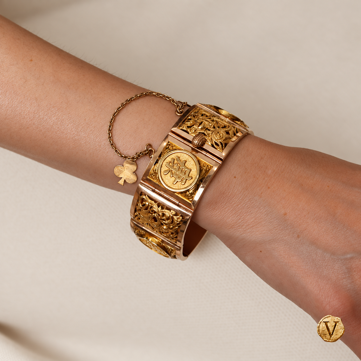 Les Quatre Saisons — vintage gold panel bracelet worn on the wrist