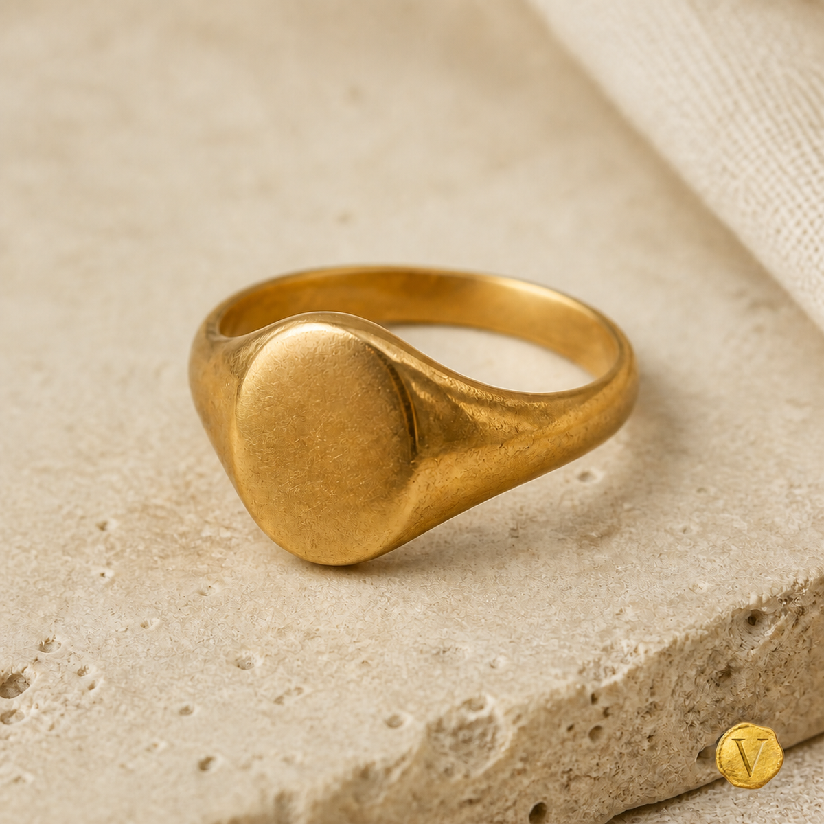 Editorial preview of an antique gold signet ring with Victoire seal